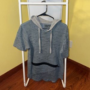 Short Sleeve with Hoodie and zipper pocket in front. MENS Size M